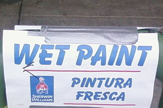 A wet paint sign