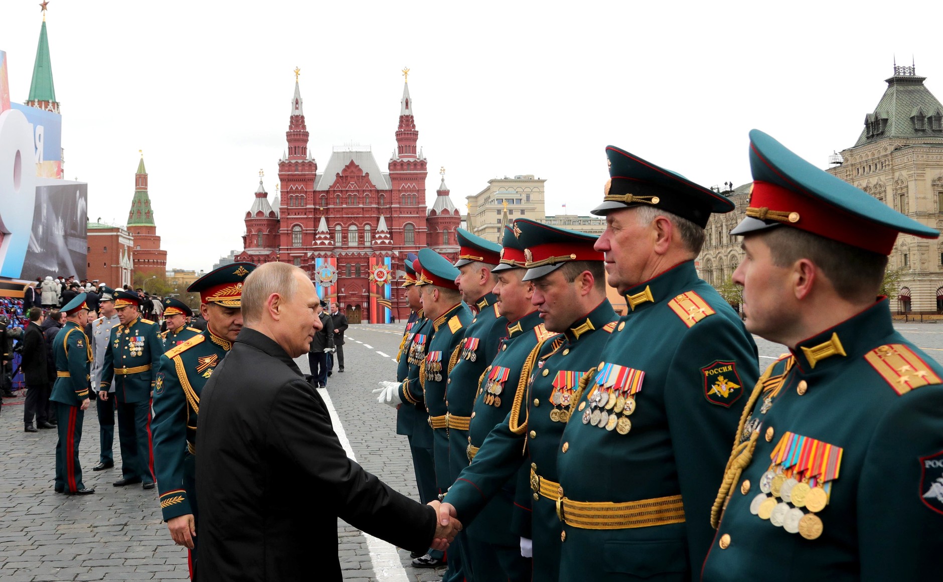 President Putin greeting the commanders of the contingents participating in the parade.