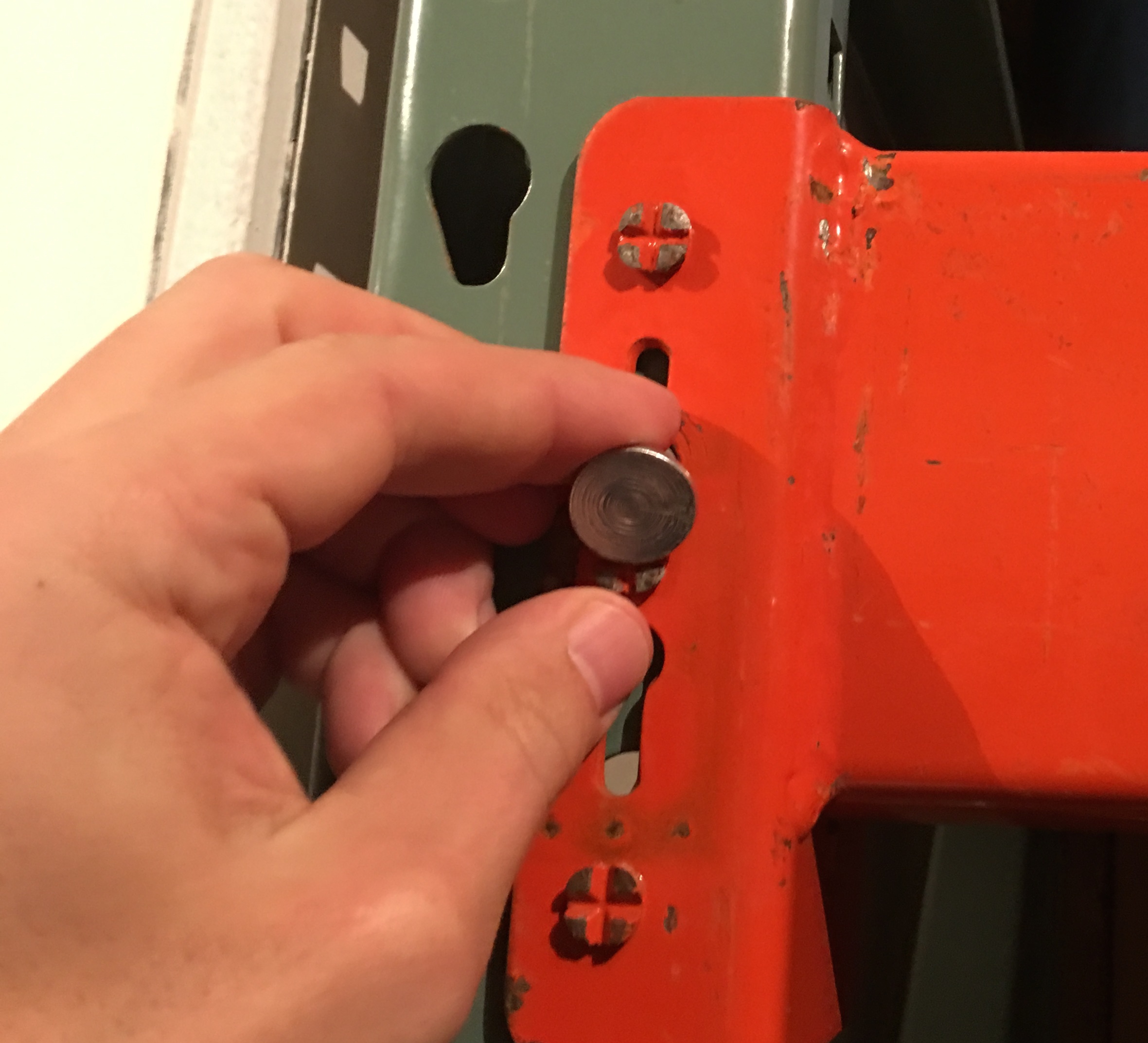 Pallet Rack Safety Bolt Installation (Watch Video) - Find 2 aligning holes in your pallet rack cross beam and pallet rack frame and drop in 