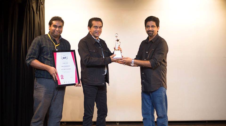 Sri Lankan Director Kamal Addararachchi receiving Best Film Award from Anurag Arora at WIIFF2017