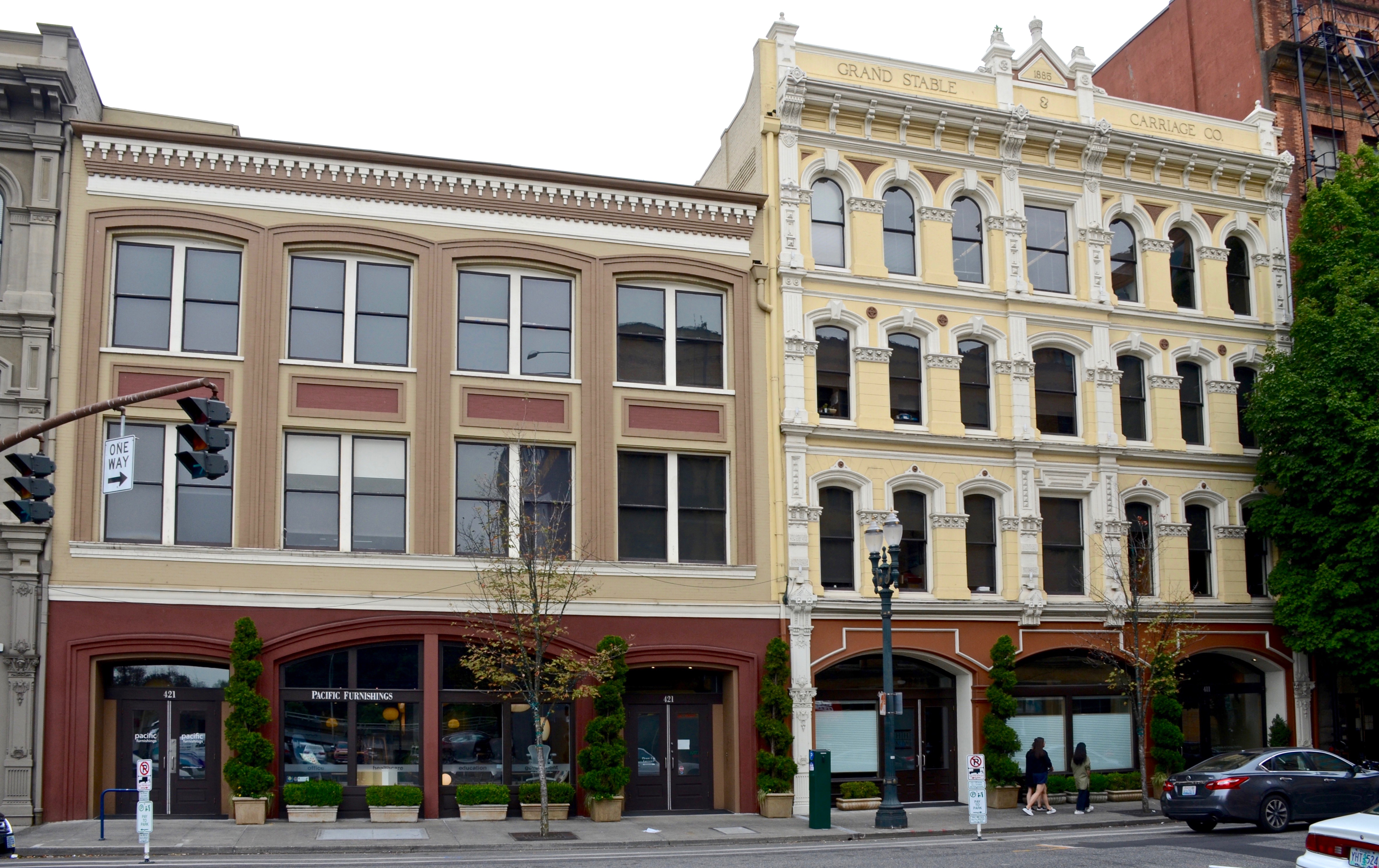 The Grand Stable and Carriage Building and an adjacent commercial building along Southwest 2nd Avenue, 2017