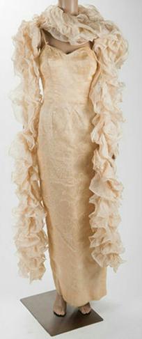  Marilyn Monroe's personally owned and worn evening gown given to columnist May Mann as a gift.