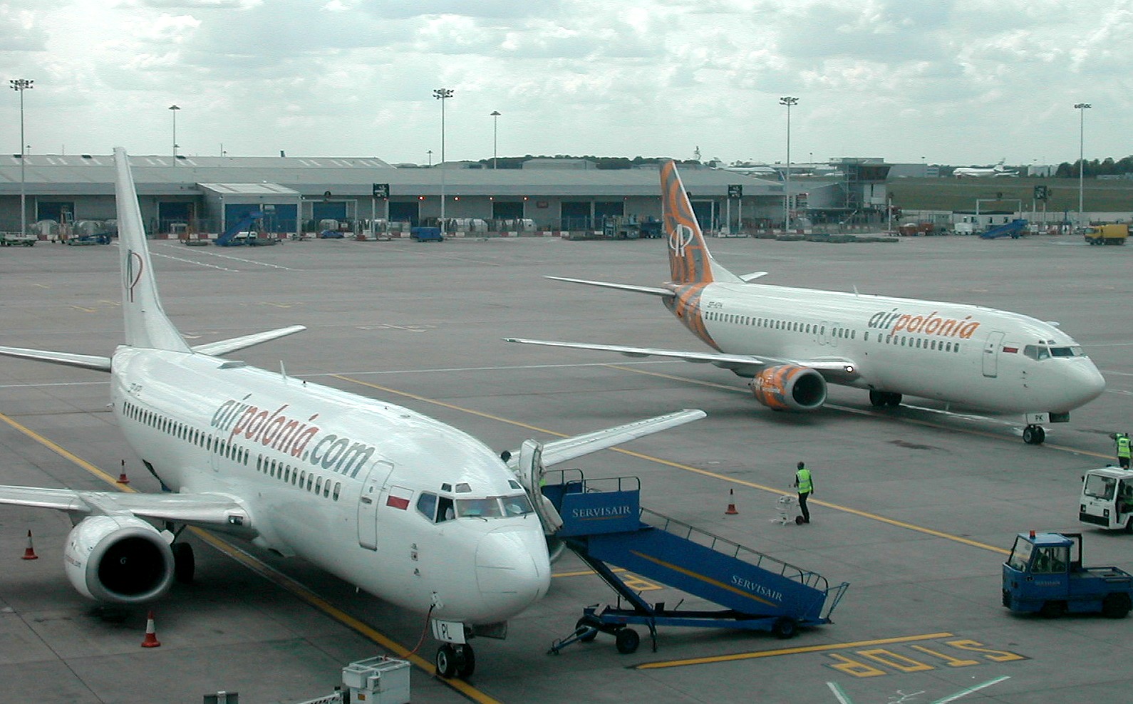 Two Air Polonia Boeing 737s at London Stansted Airport, England. (2004)