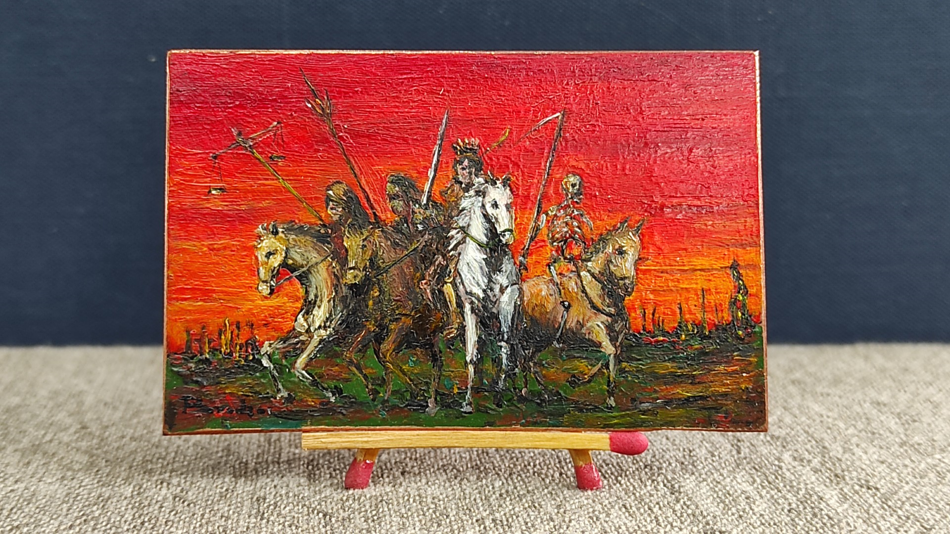 Four Horsemen of the Apocalypse, a 2025 miniature painting by Paweł Brodzisz, depicts the riders moving as a group from left to right: Famine, War, Pestilence, and Death. It is an oil and alkyd on copper painting, measuring 50 × 77 mm.