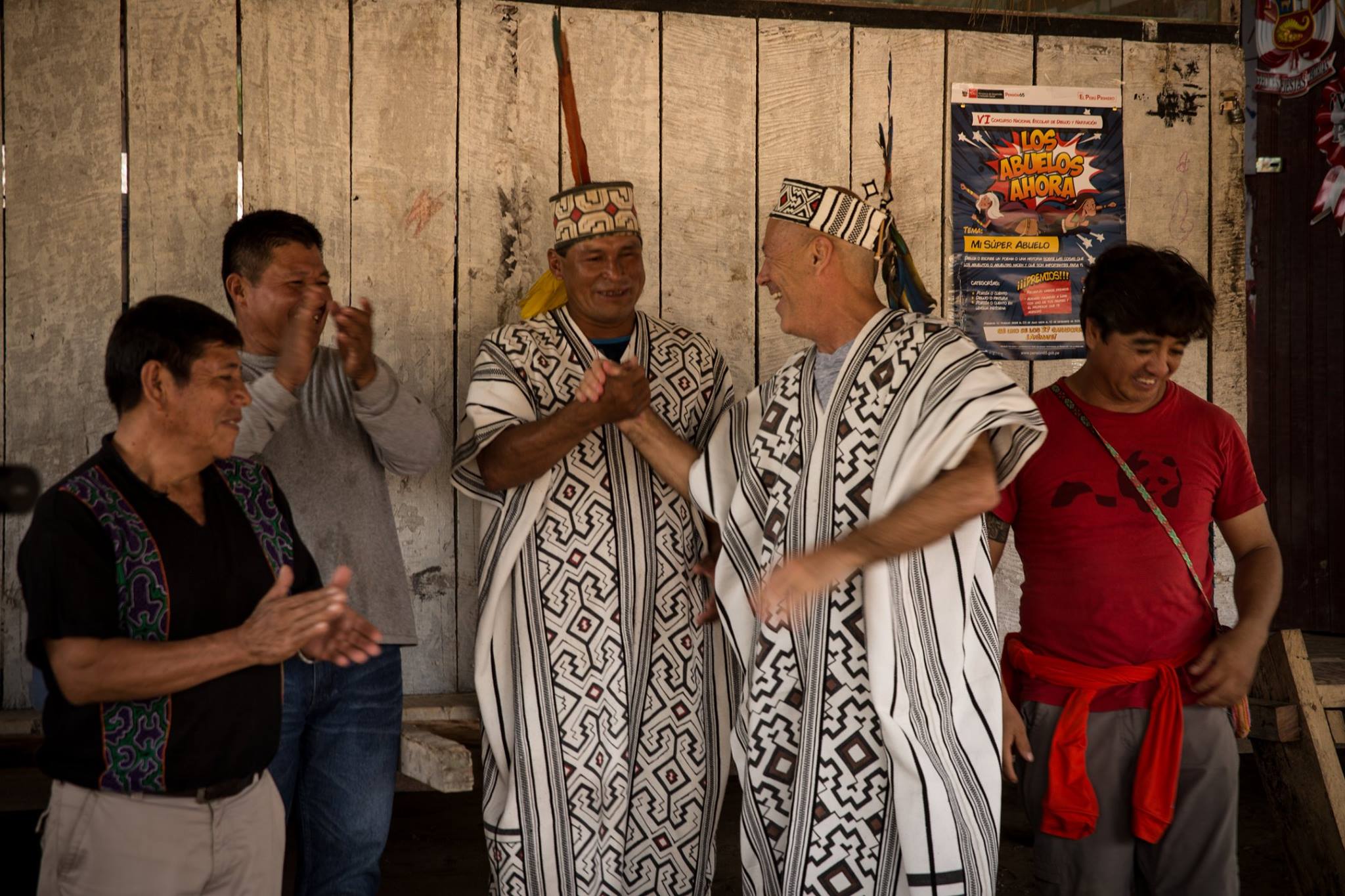 David Batstone and Mark Wexler with indigenous community, Madre de Dios, Peru