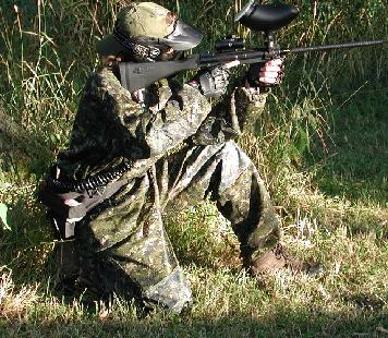 Woodsball marksman preparing a long shot. Camouflage is easily one of the most important tools of a marksman, right on par with his marker.