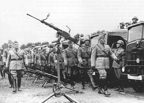Mussolini inspecting members of the Italian Expeditionary Corps in Russia Mussolini inspecting members of the Italian Expeditionary Corps in Russia