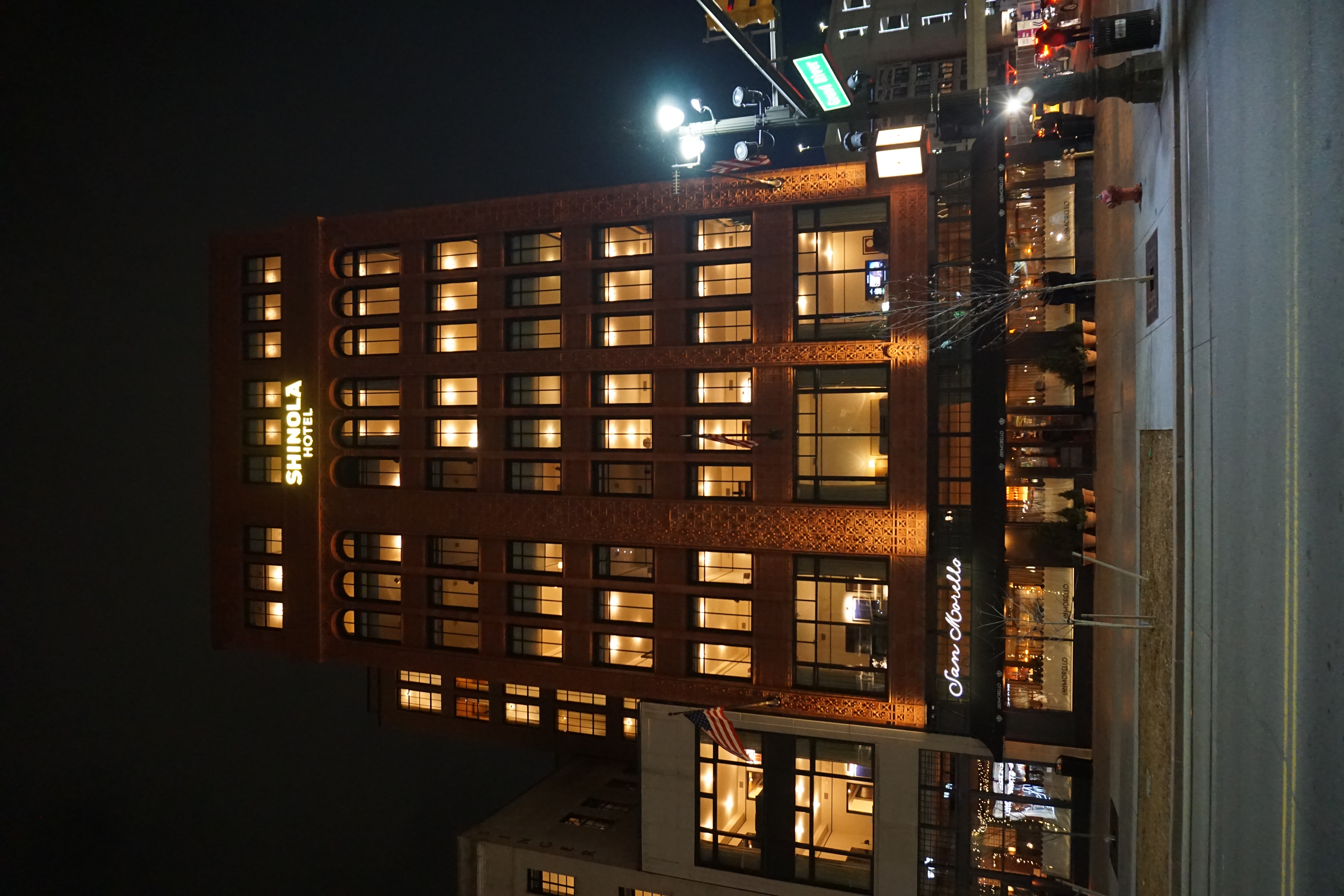 Shinola Hotel’s Rayl Building facade illuminated at night