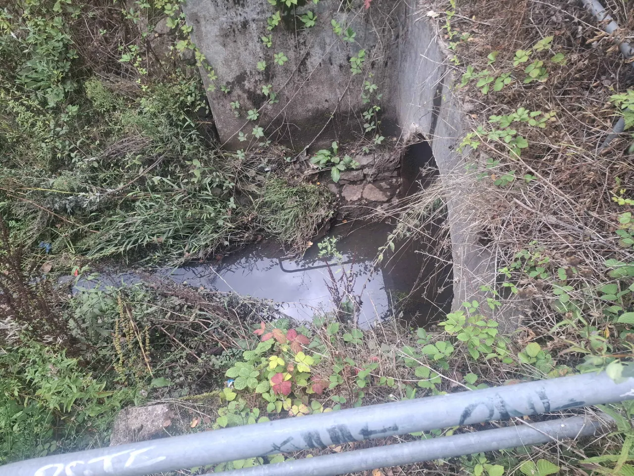 Sneyd Brook entering a culvert near its confluence with the River Tame in Darlaston ()