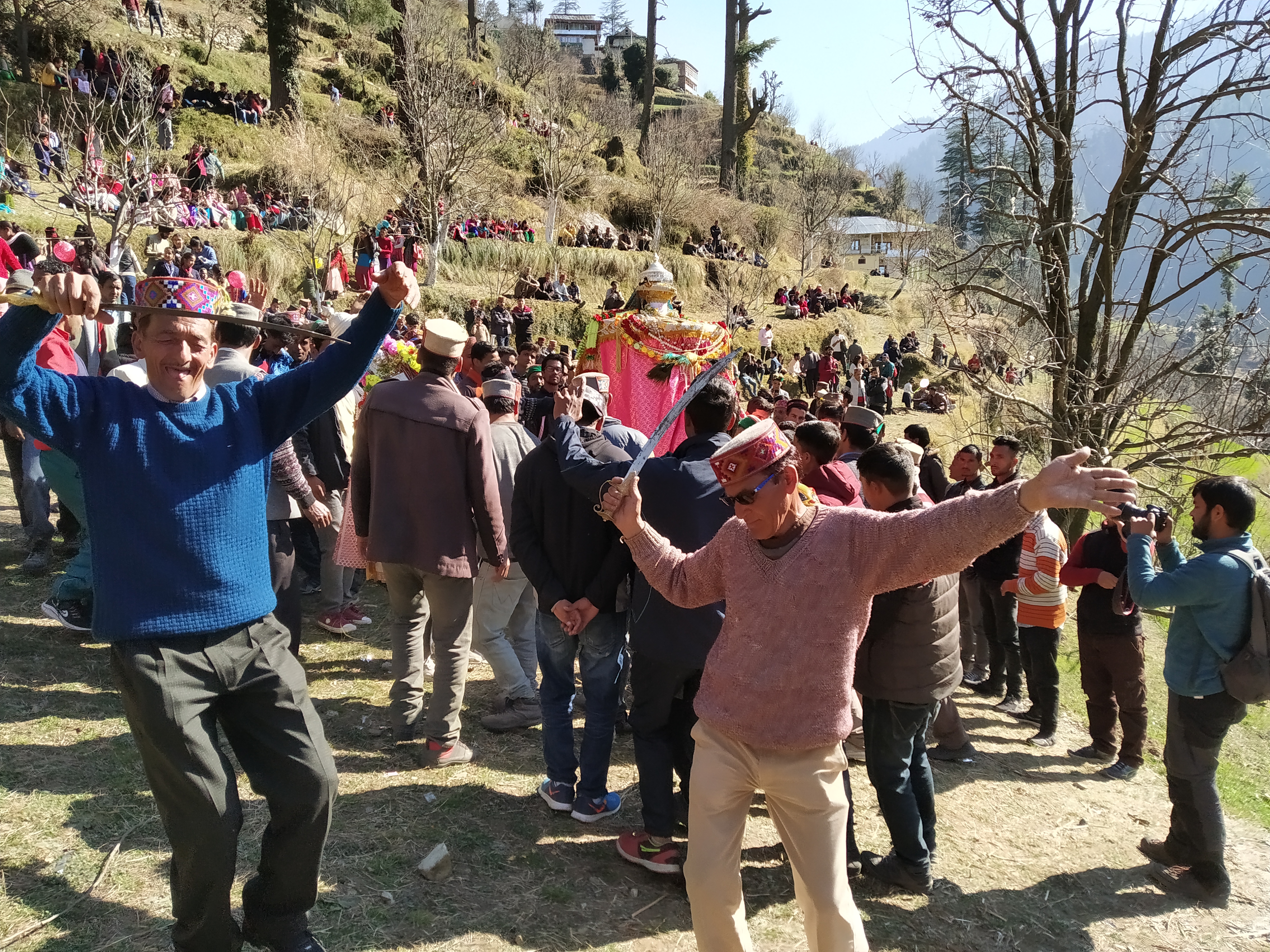 Himachali men performing Nati with swords in Dev Jagar