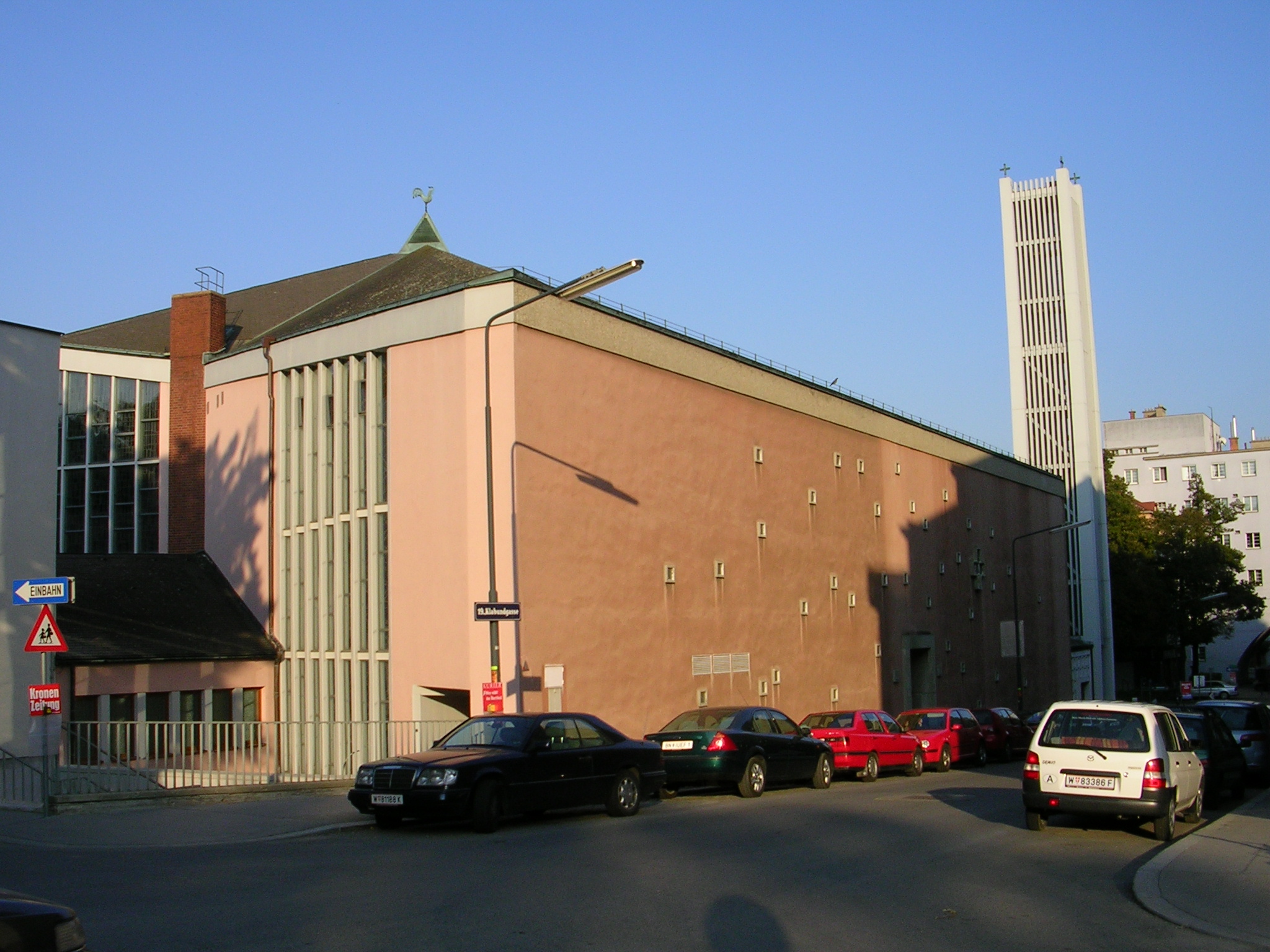 Unterheiligenstadt Parish Church. The Karl-Marx-Hof can be seen in the distance
