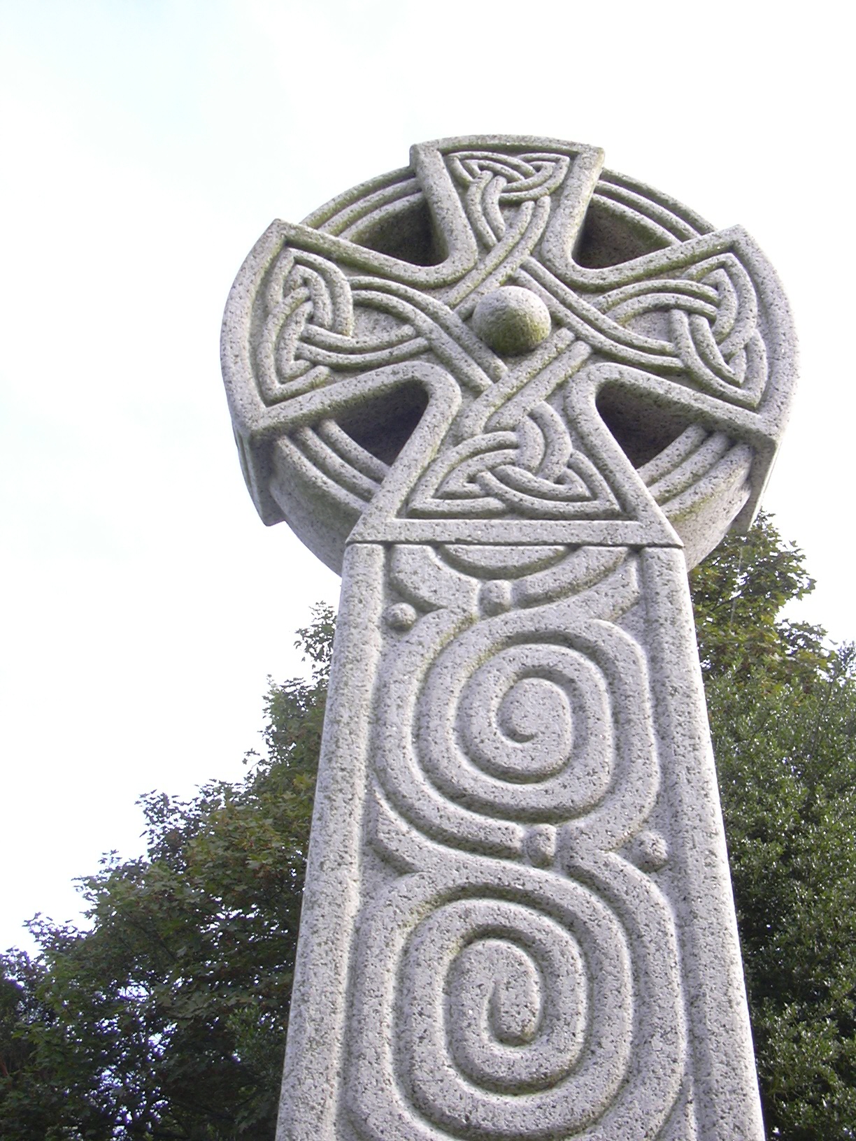 Constantine War Memorial, in the churchyard, carved from local stone by Elkana Symons in the form of a Celtic cross