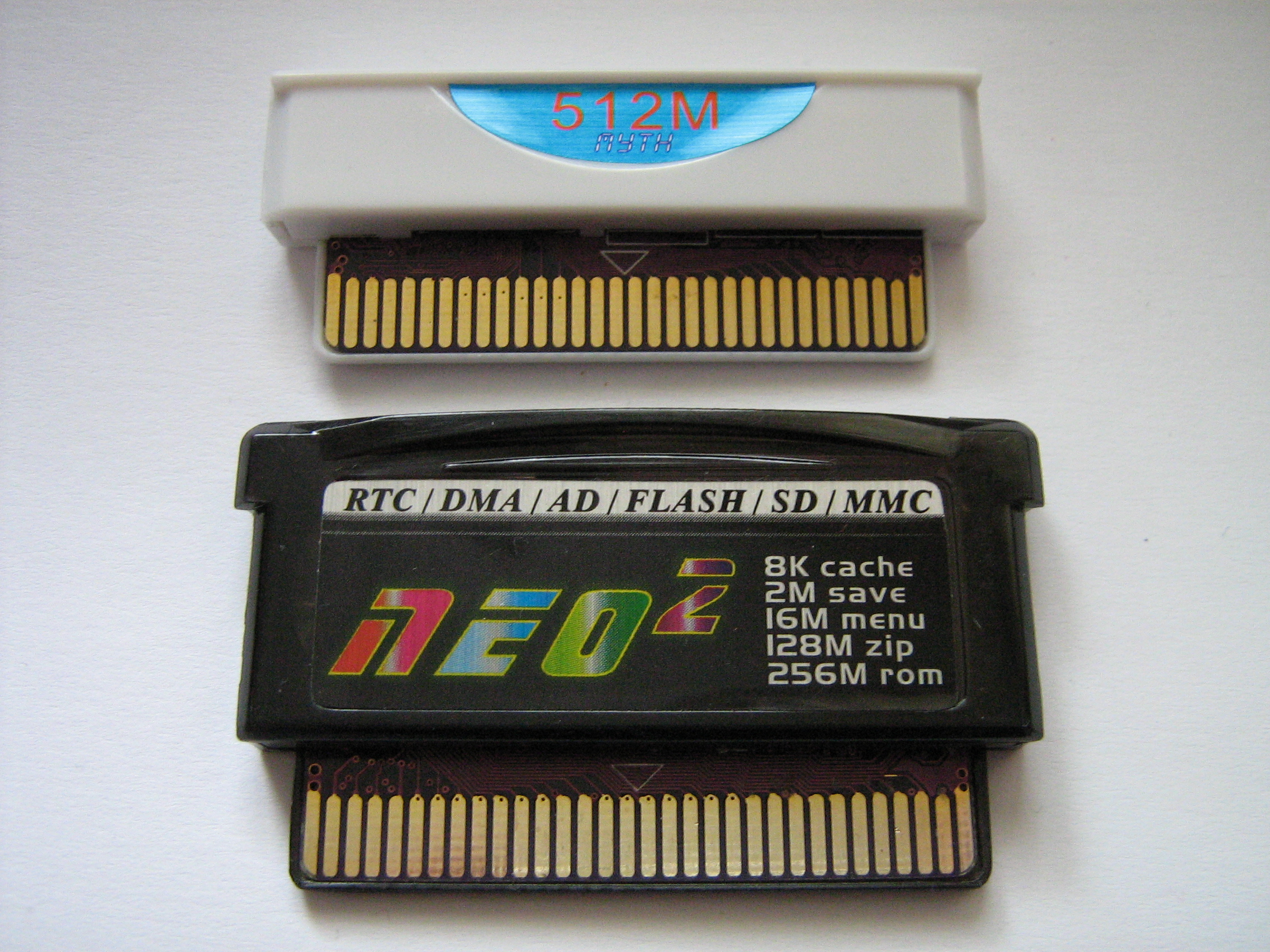 The included NEO2 Lite 512M cartridge, and optional NEO2-SD cartridge