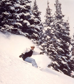 Lauren Abraham riding backcountry, Crystal Mountain, WA
