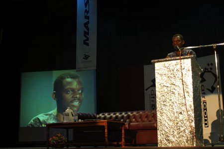 Mungoshi delivering his speech at the 7 Arts Theater, Harare, Zimbabwe