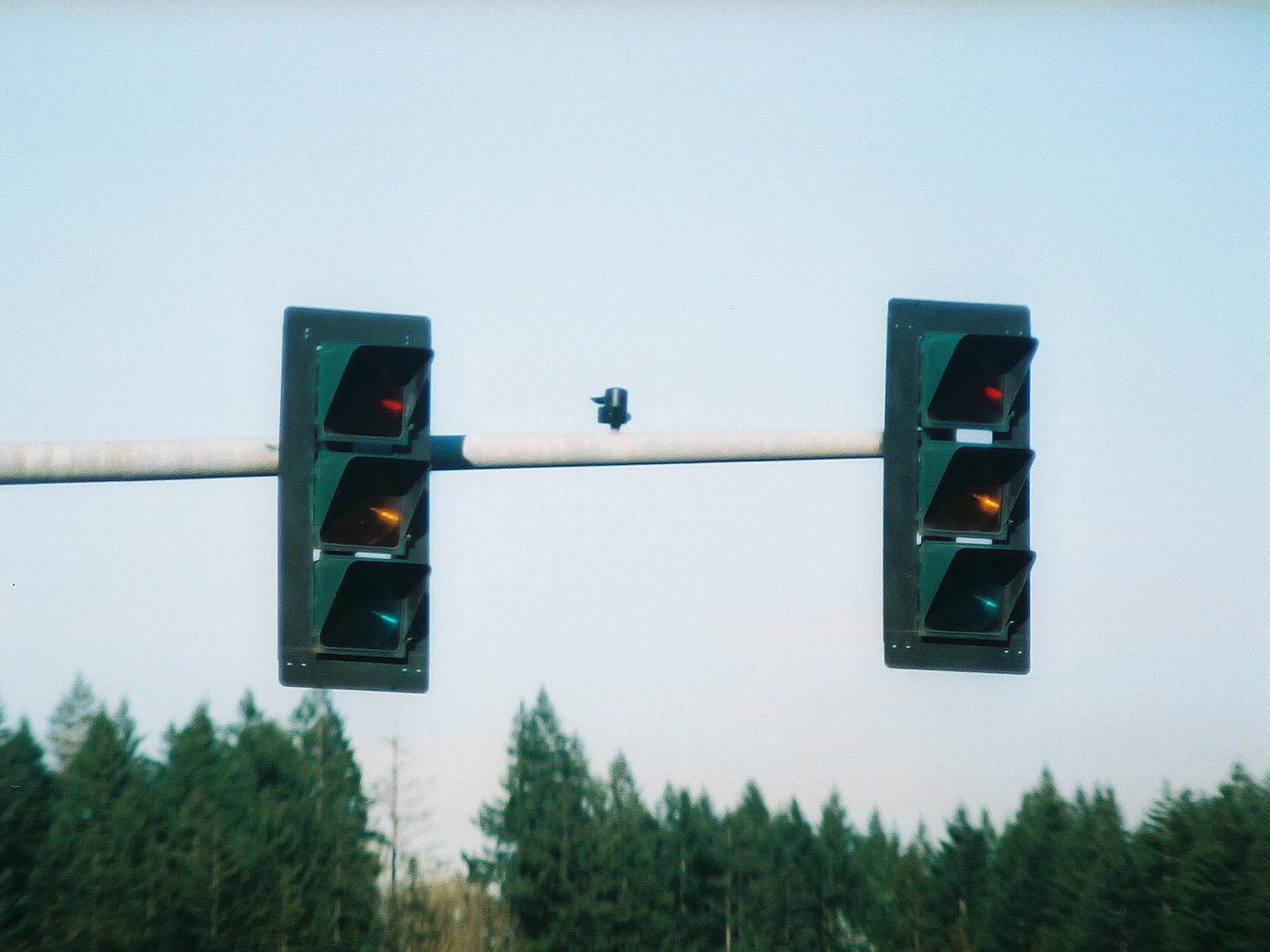 3M traffic signals installed in Shelton, Washington. Standing off-axis from the intended viewing area, these signals appear to be "off" or invisible to adjacent lanes of traffic during the daytime. (A faint glow is present in the lit indication when viewed at night)