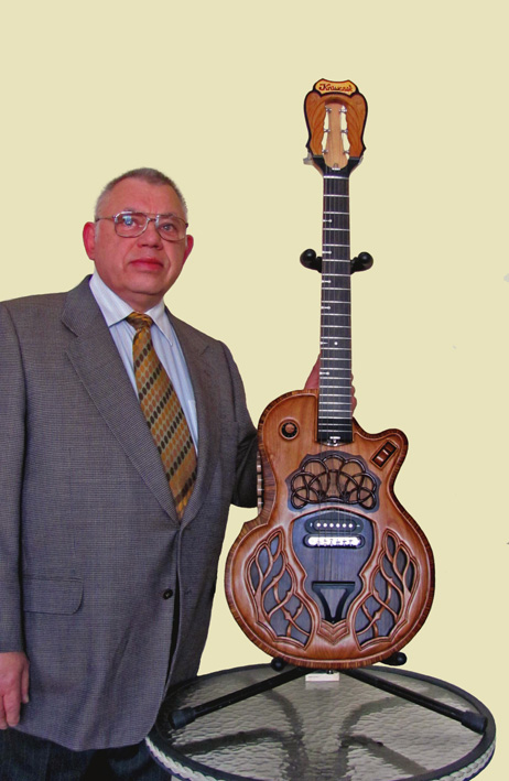 Kaz Krawczak and his model 26 guitar